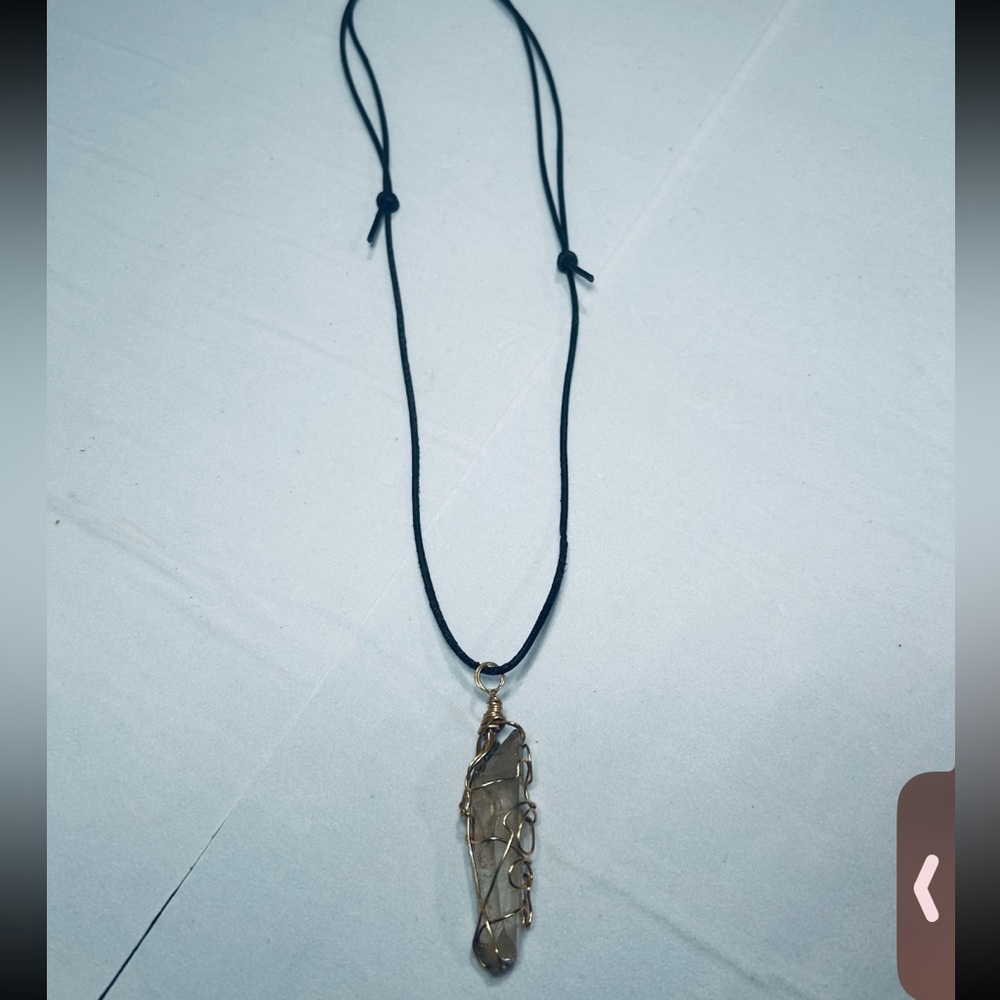 Arkansas mined natural crystal on adjustable leather necklace!